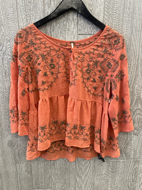 women's tops for those who want to create stylish and put-together outfits without spending a fortuneTop Long Sleeve By Free People In Orange, Size: S